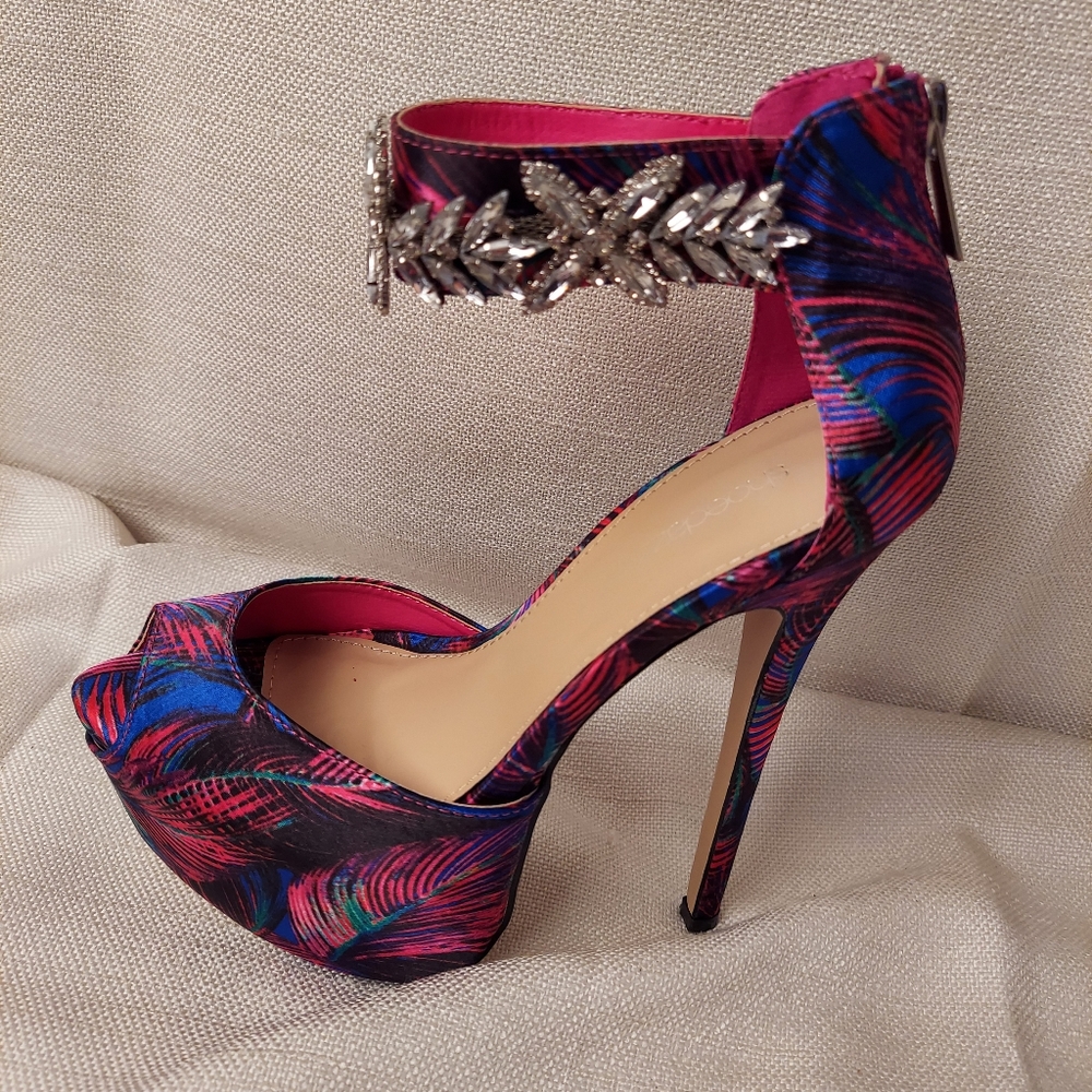 Women's size 7 heels with rhinestone ankle straps and zip closure